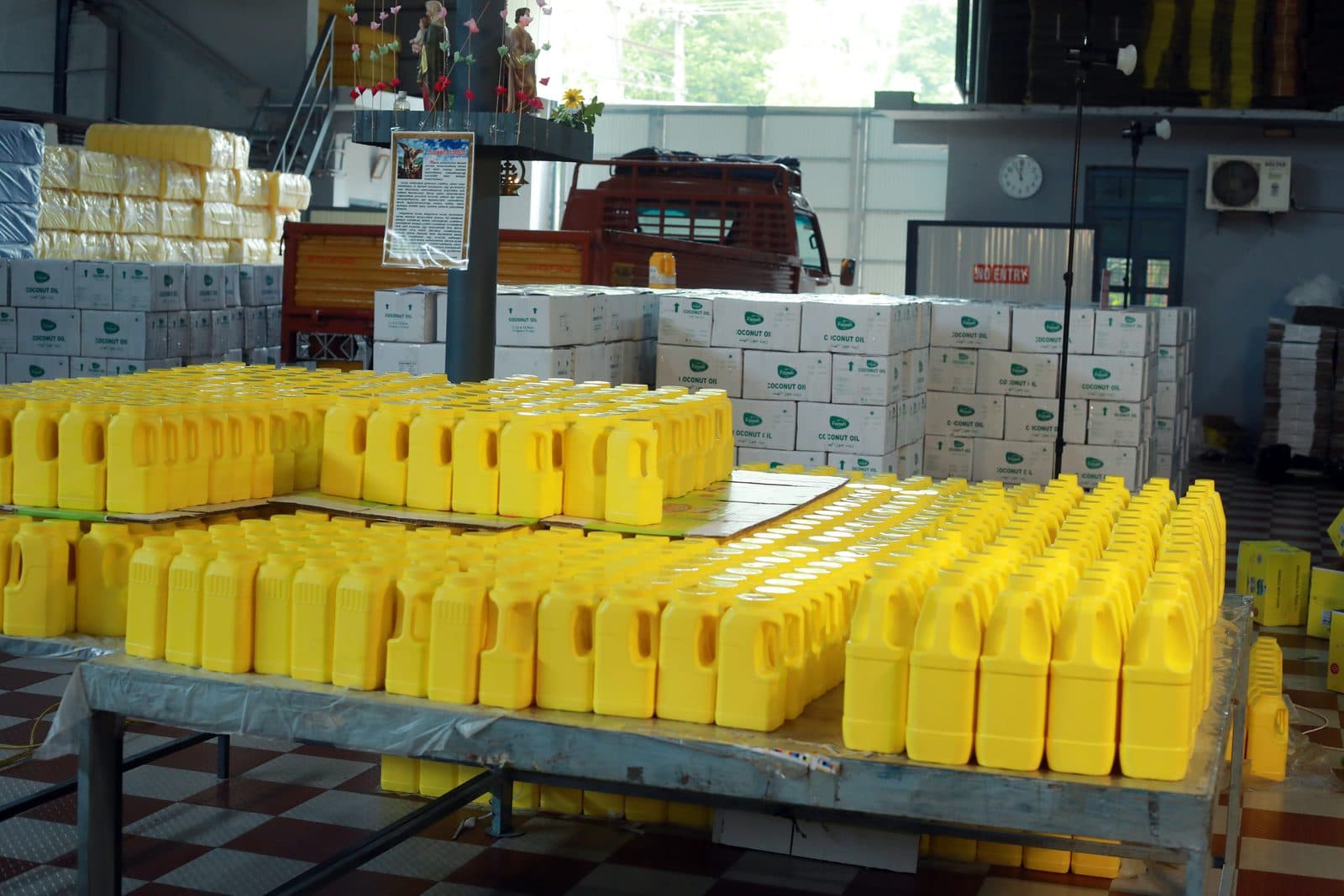 Filled cans lined up for a final check before they are packed.